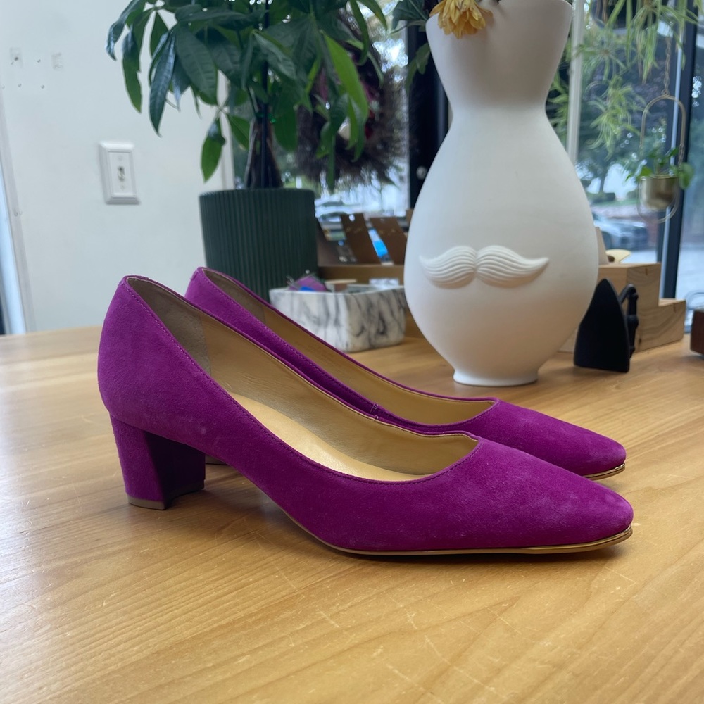 Talbots pumps in purple suede color with a little gold accent at the top of toe.